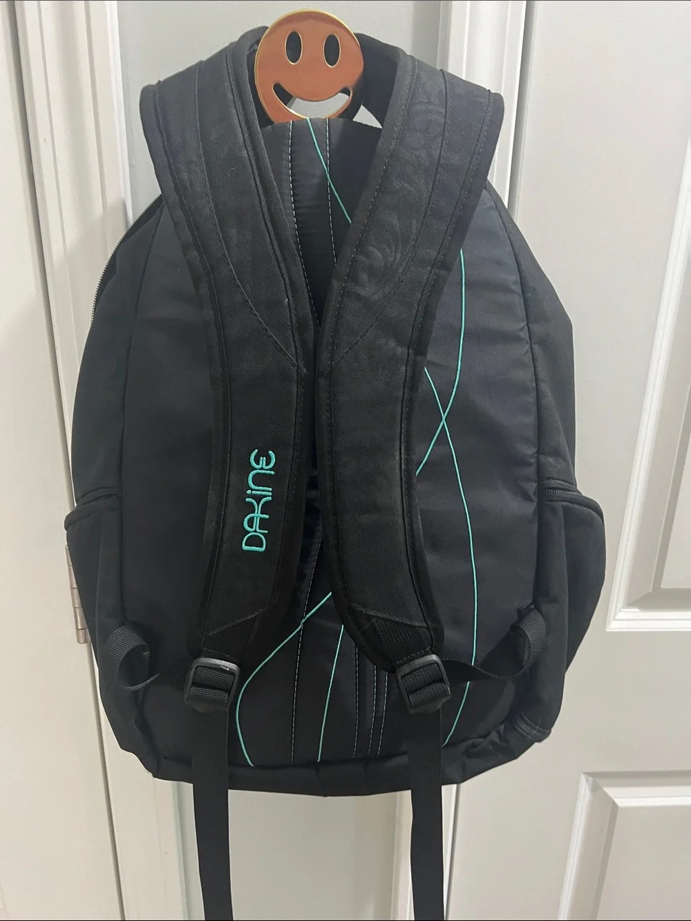 Dakine Black Backpack with Teal Accents